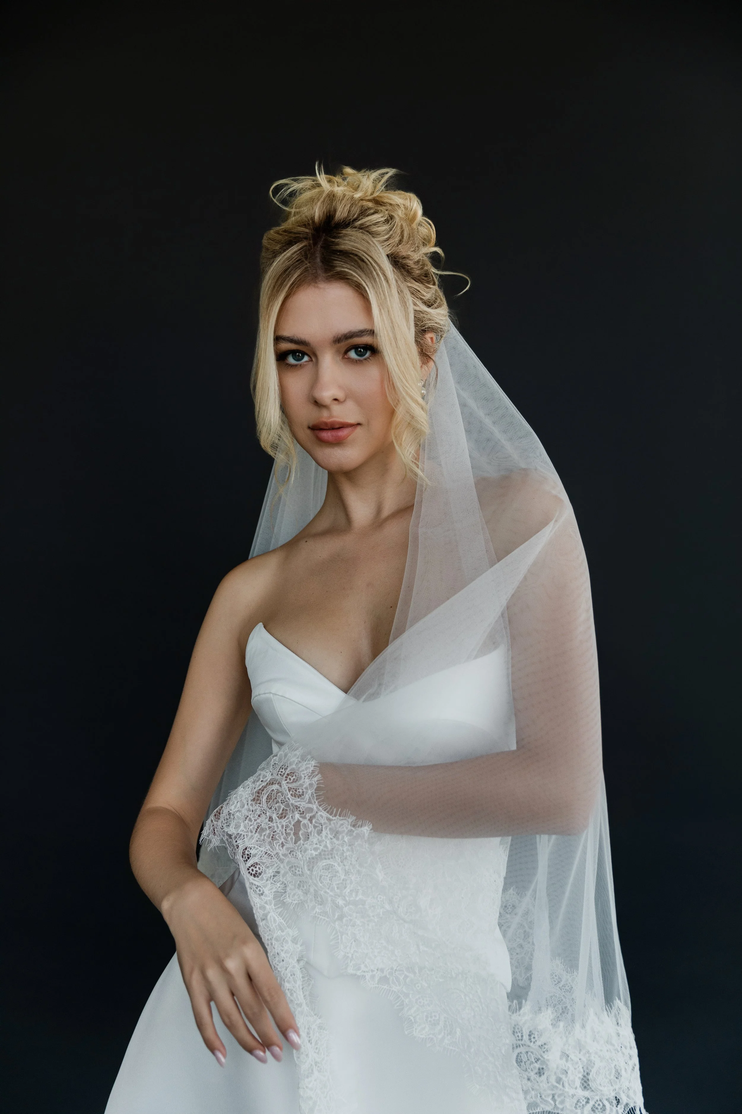 Beautiful two-piece satin gown. A-line skirt with  a structured bodice. Timeless meets modern style!