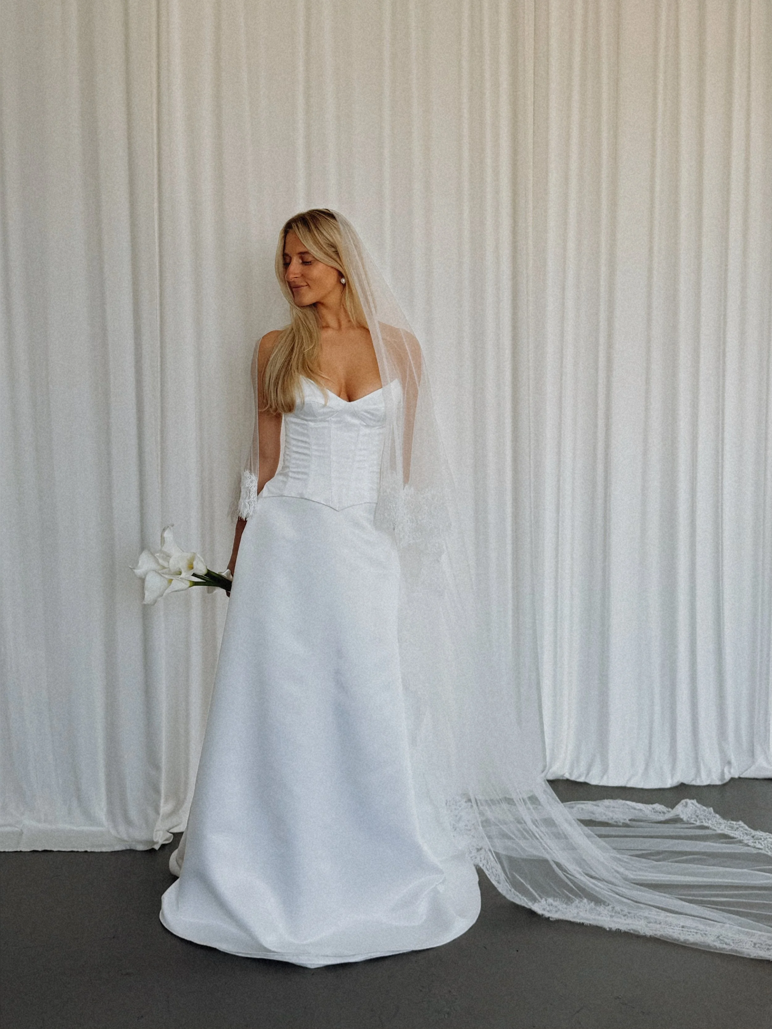 Beautiful two-piece satin gown. A-line skirt with  a structured bodice. Timeless meets modern style!