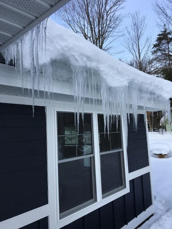 Four-foot icicles over the windows, every winter.