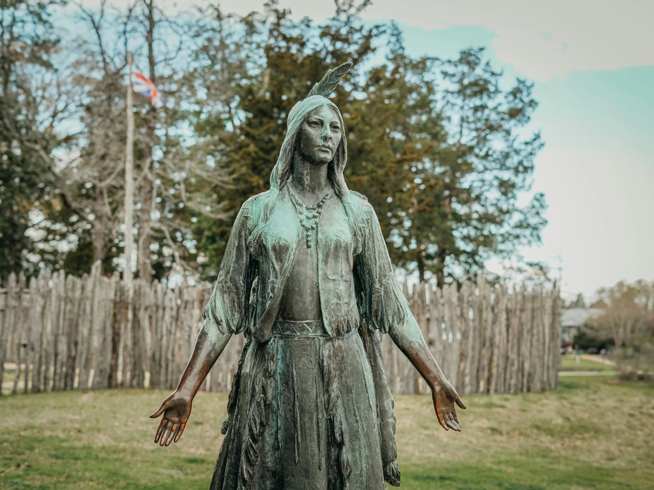 Photo of bronze Pocahontas Statue located at Historic Jamestowne in Virginia by EricThriller on Unsplash