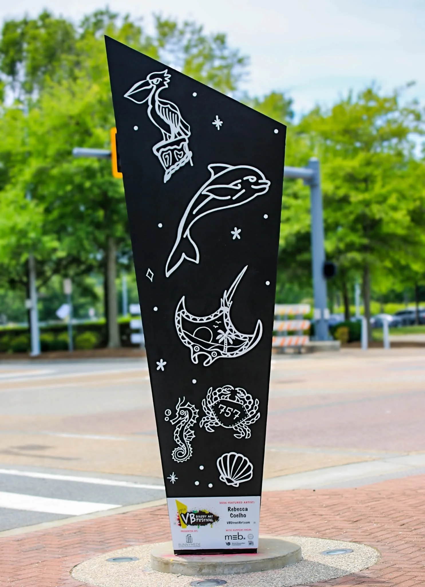 Wildlife side of Rebecca Coelho's Virginia Beach mural featuring marine life and coastal animals that represent the natural beauty and biodiversity of the Hampton Roads region.