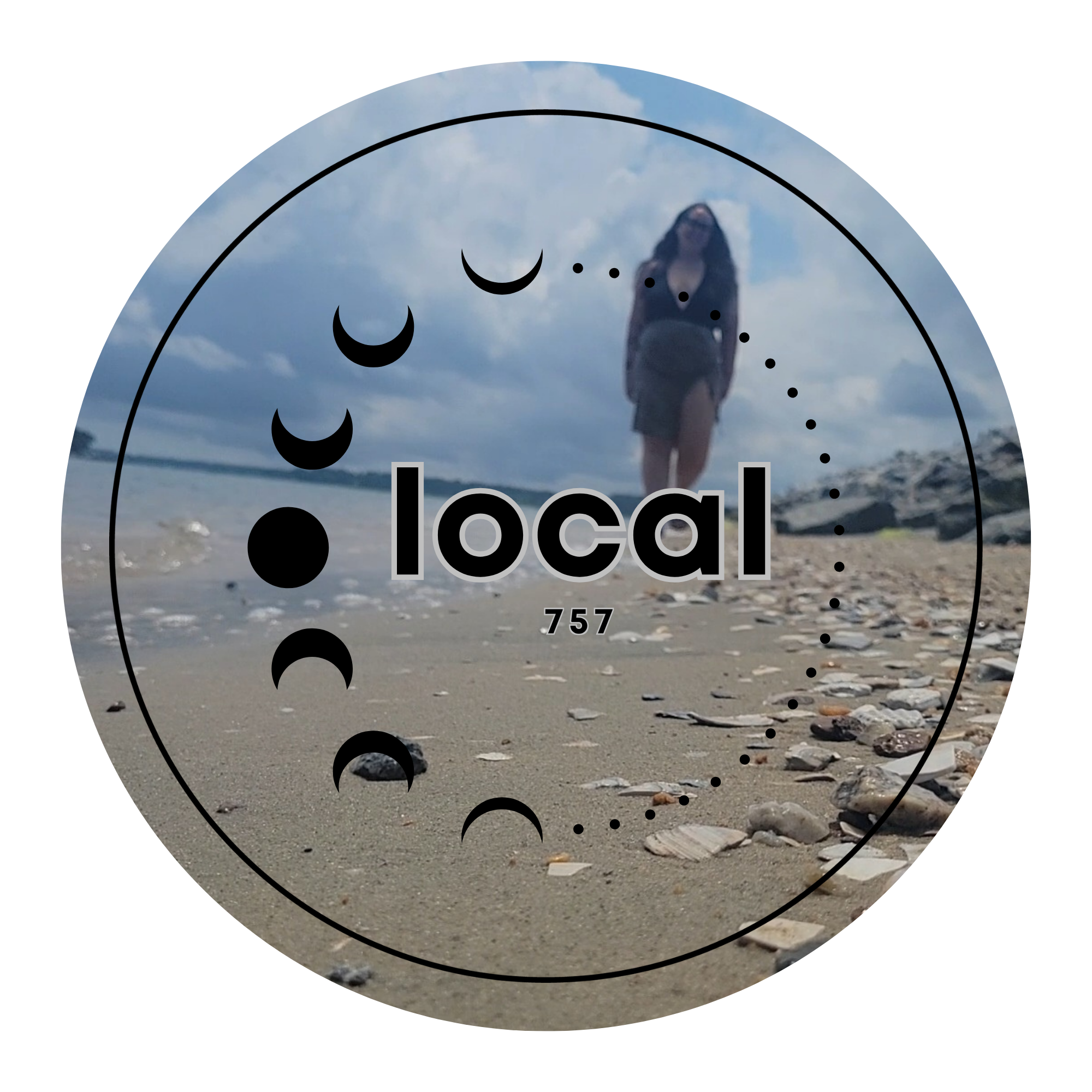 Woman walking along a shell-covered Beach in Hampton Roads, Virginia, with moon phase circle design and  "local 757" text overlay