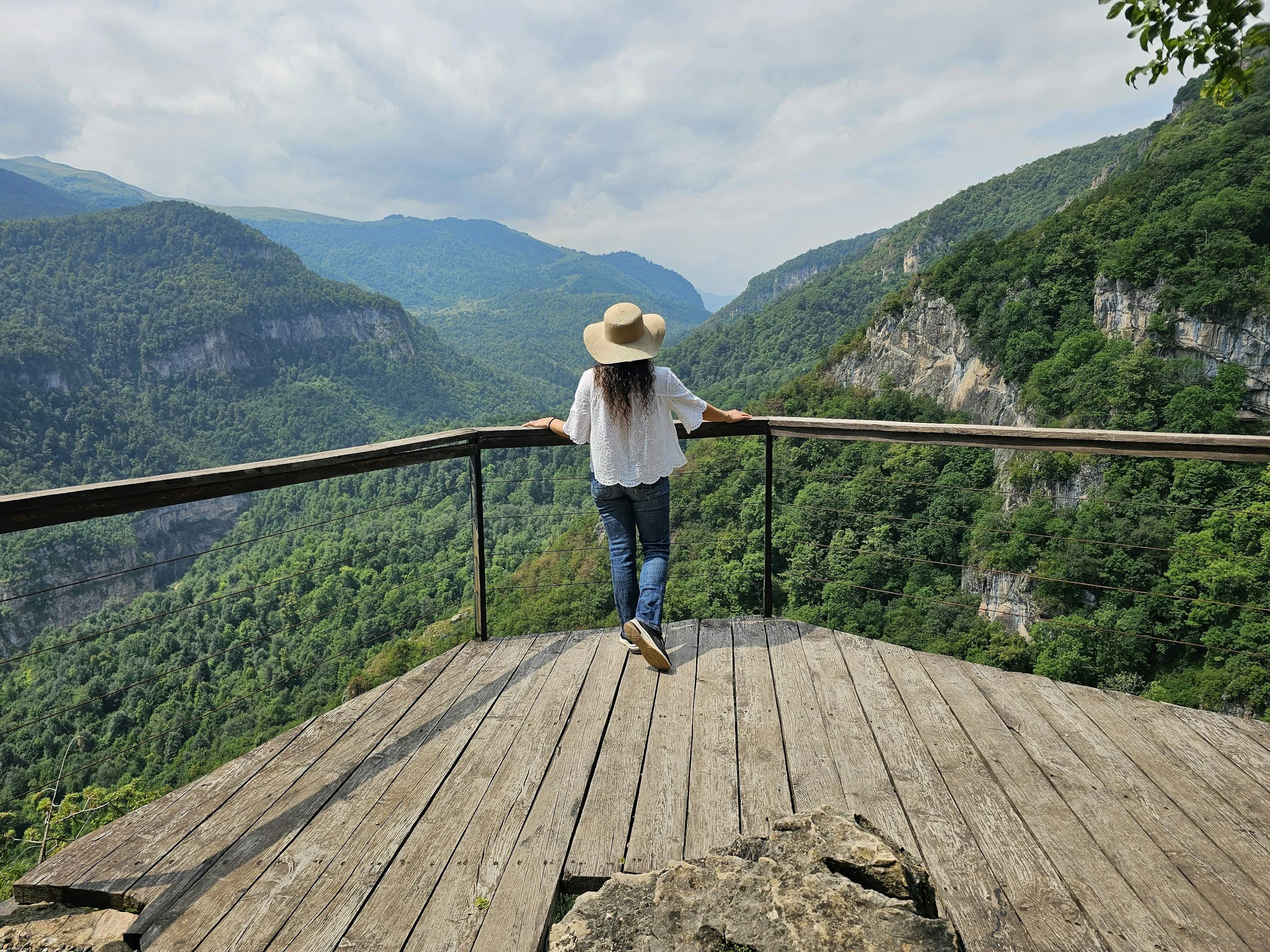 Woman walking outdoors during a life transition, looking thoughtful and grounded.