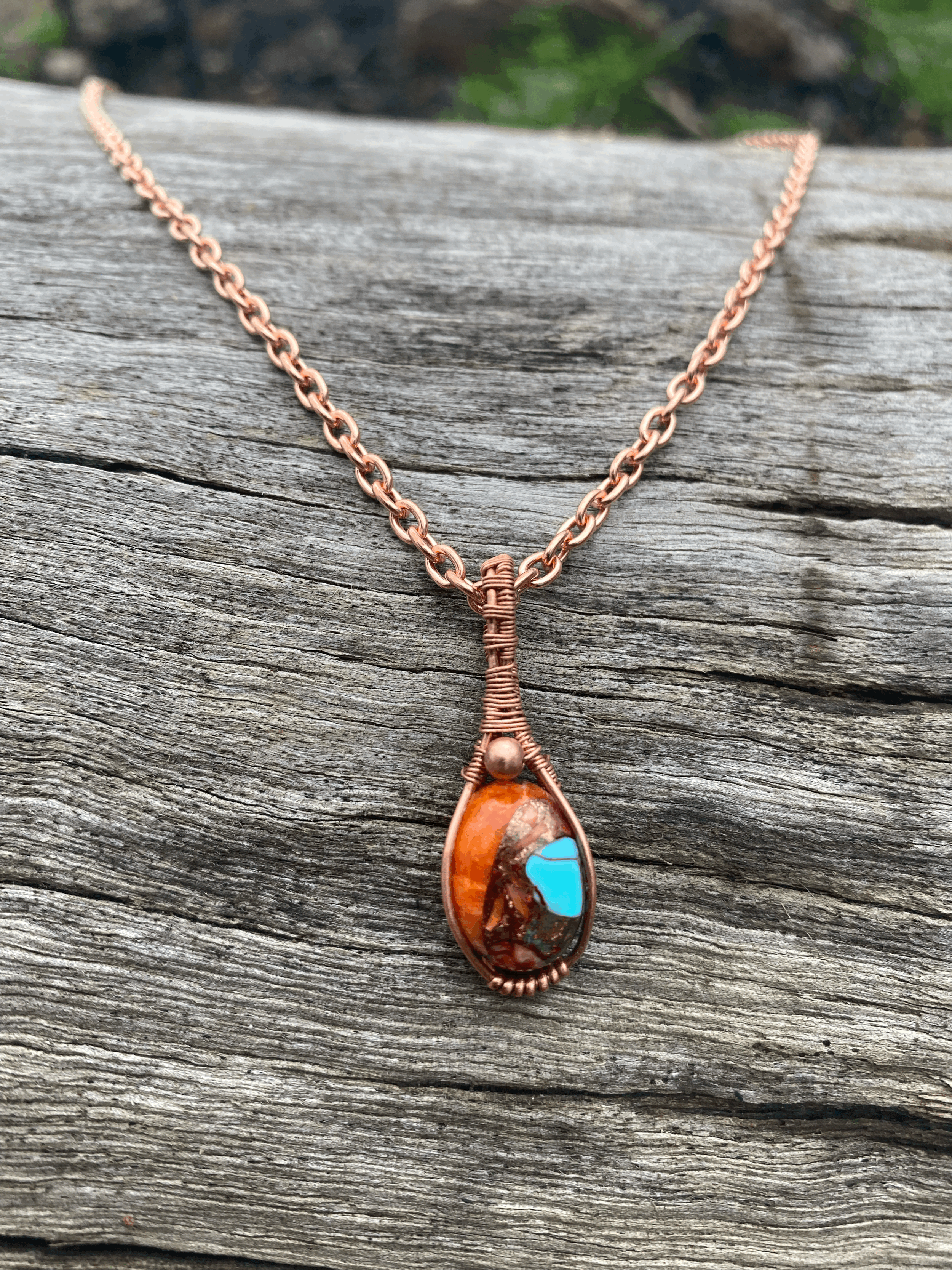Plain copper chain with 'Tabitha' style pendant housing a Pink Spiny Oyster Stone. Our most popular stone to date.