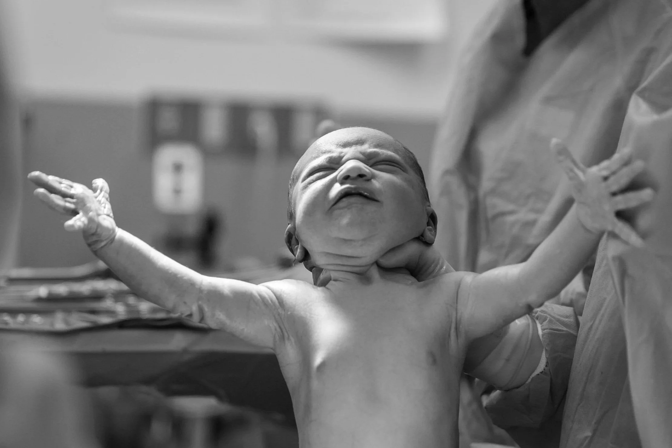 baby being born revealing gender