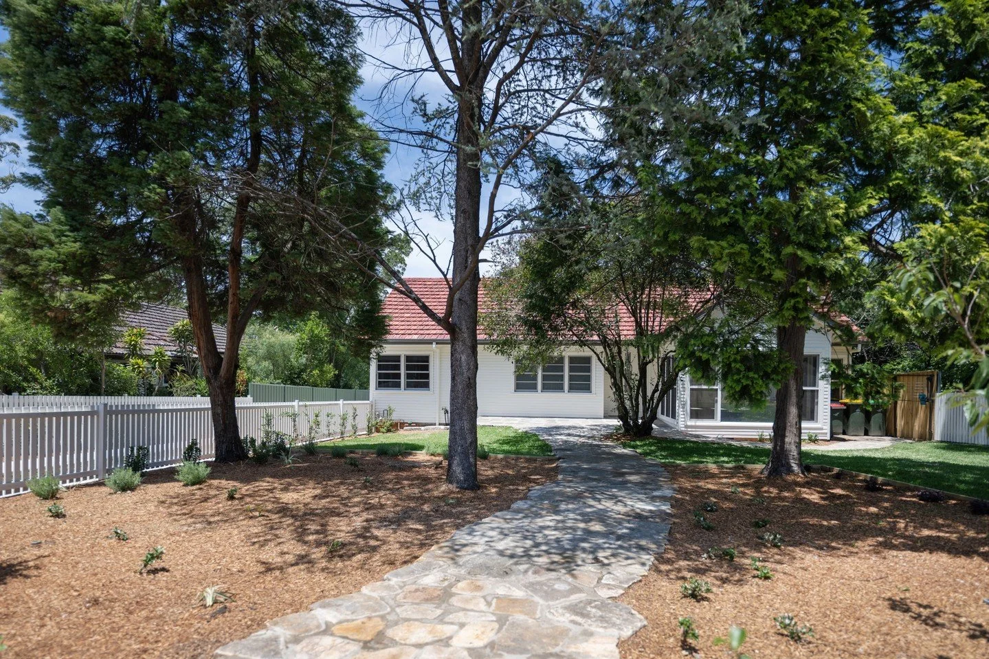 The Cottage at The Village, Springwood.

This heritage-significant cottage underwent a beautifully restored exterior transformation, retaining the original terracotta roof and cladding. 
Extensive repair works were carried out to the original windows