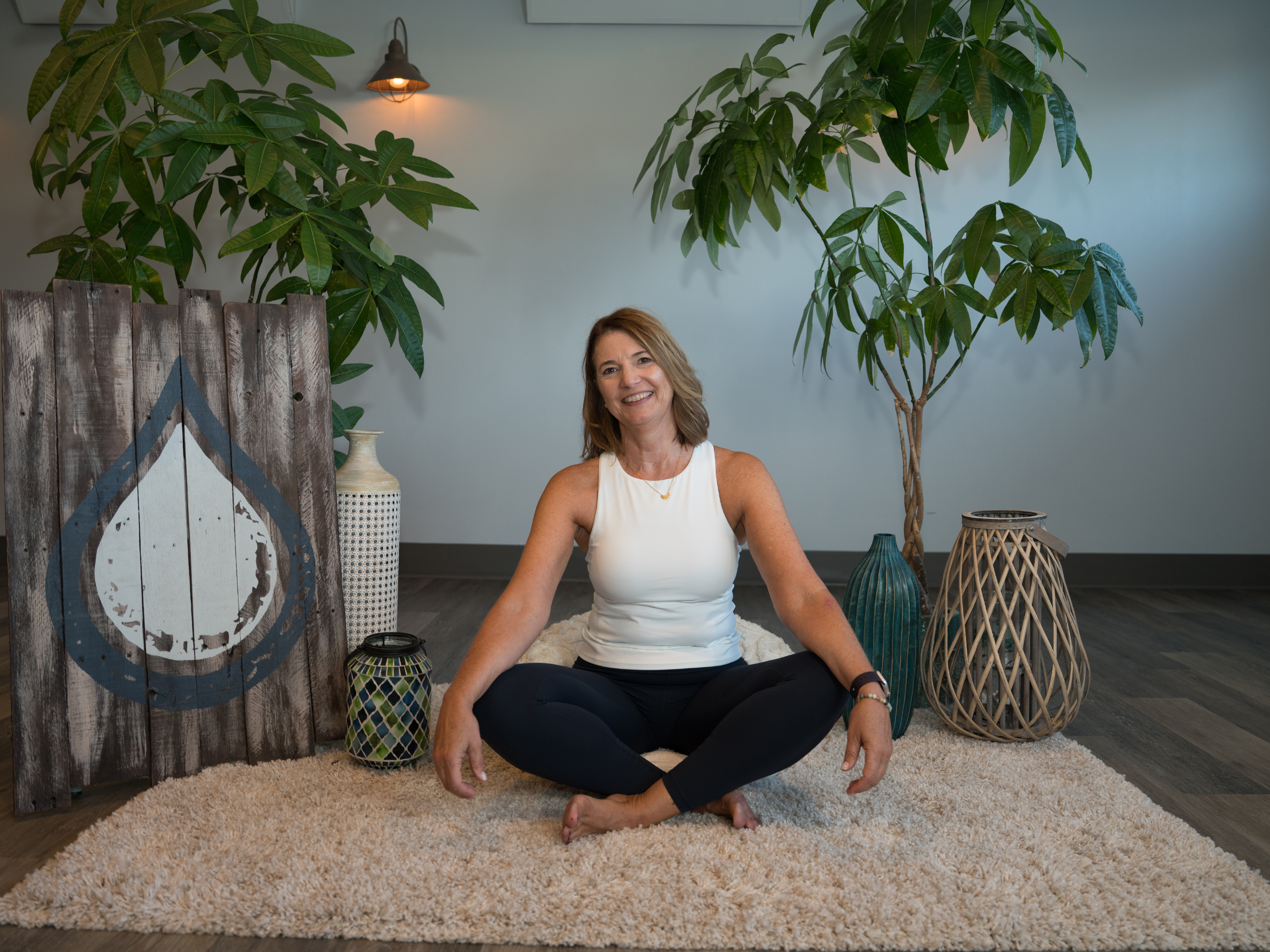 Karen Szymko in the Siddhasana pose