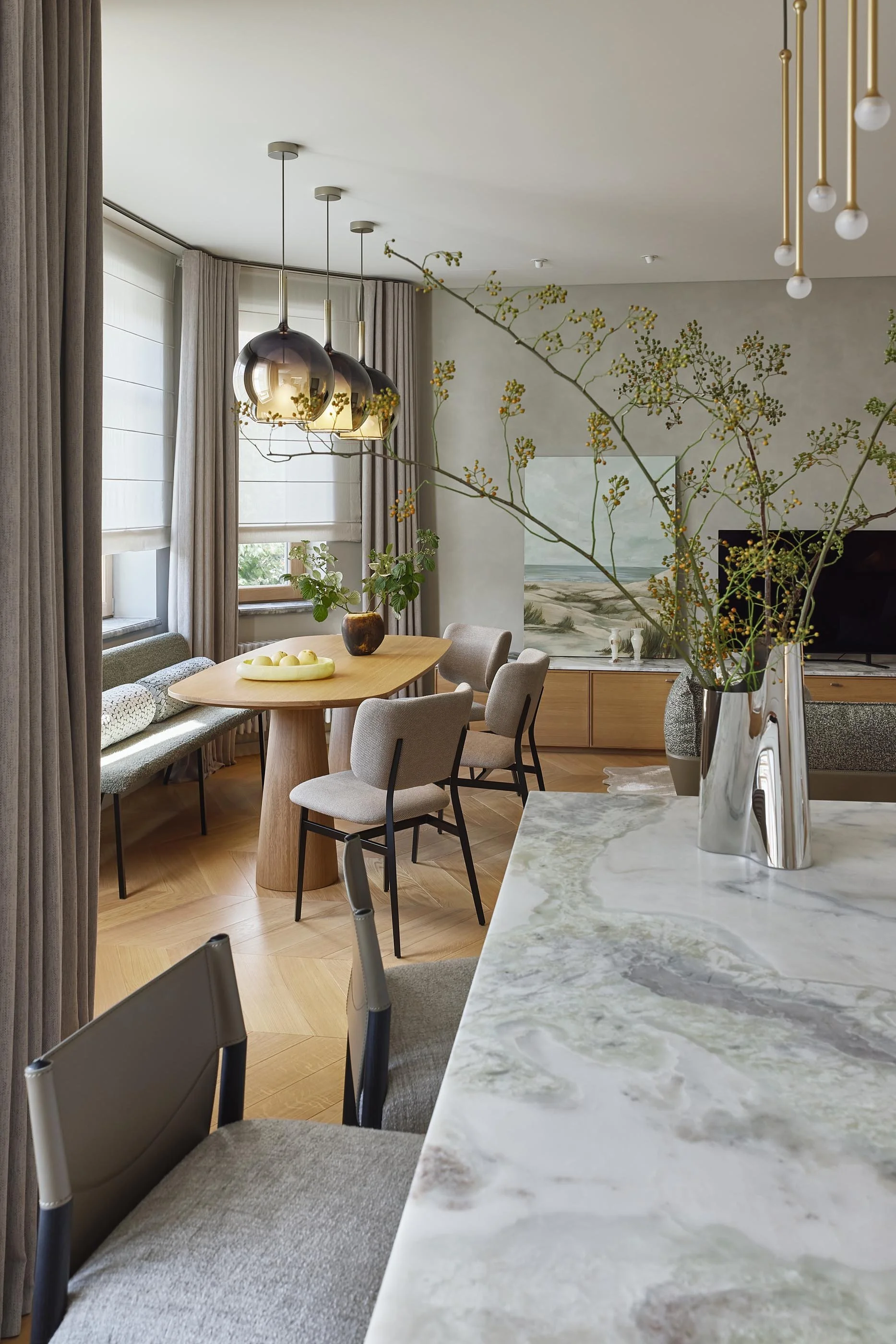 Smoked Glass Pendants over an Oak Dining Table in a Bay Window