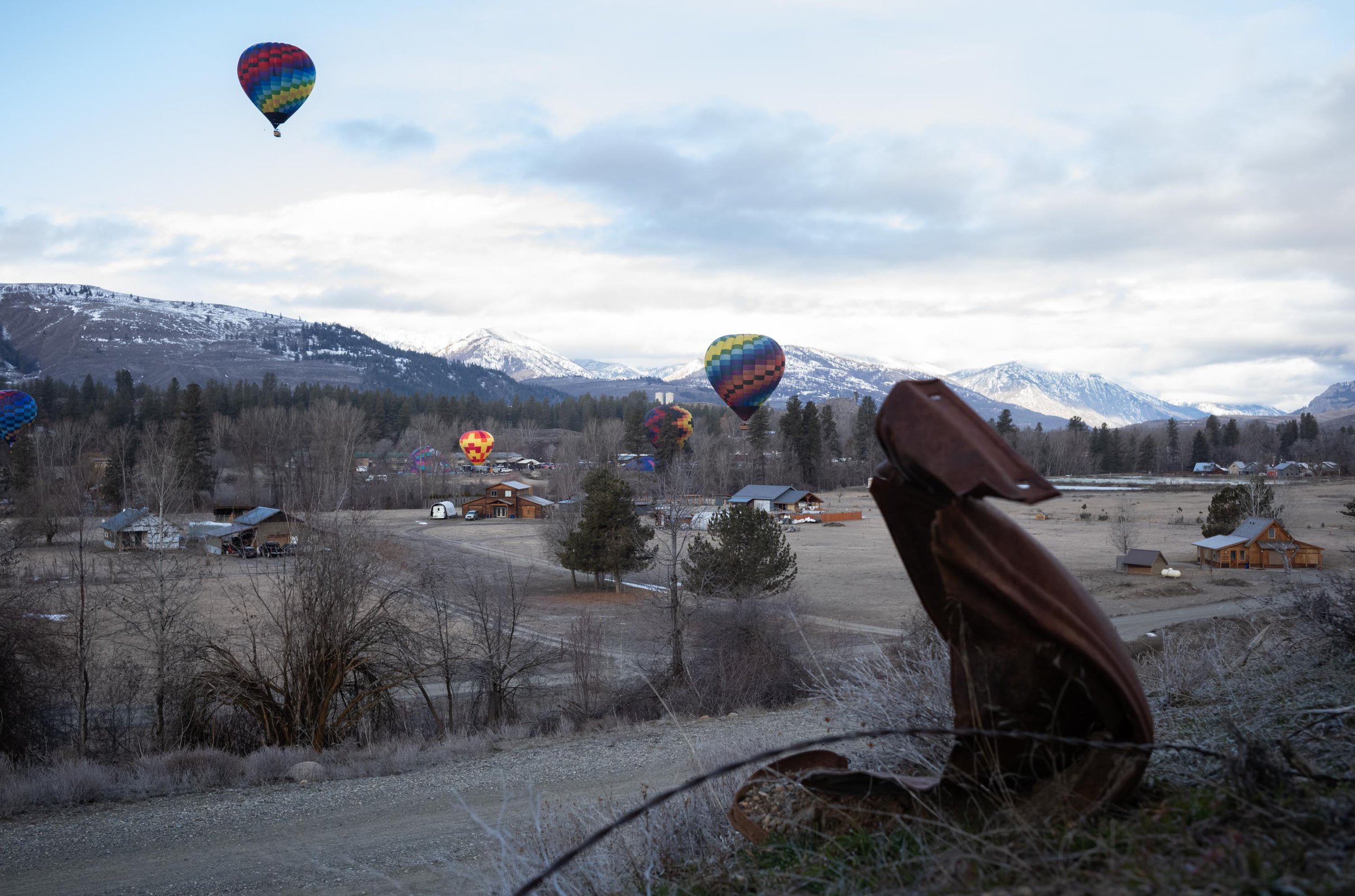  Hot air balloons float over the Methow Valley, Washington State, USA on March 1, 2024. 