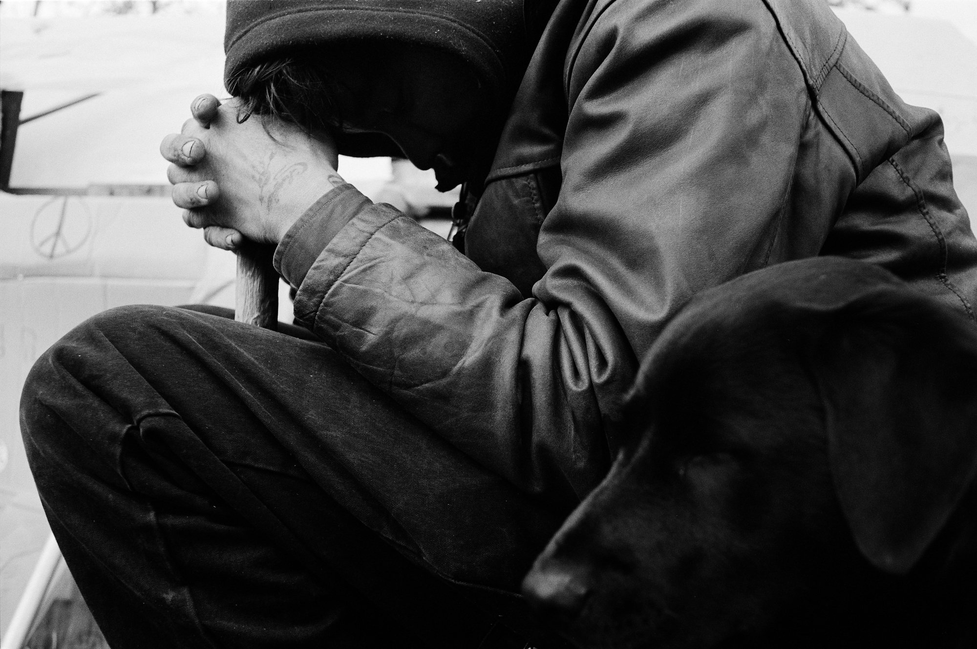  A man is too sick to raise his head at the Occupy camp in Seattle, Washington, USA on November 19, 2011. 