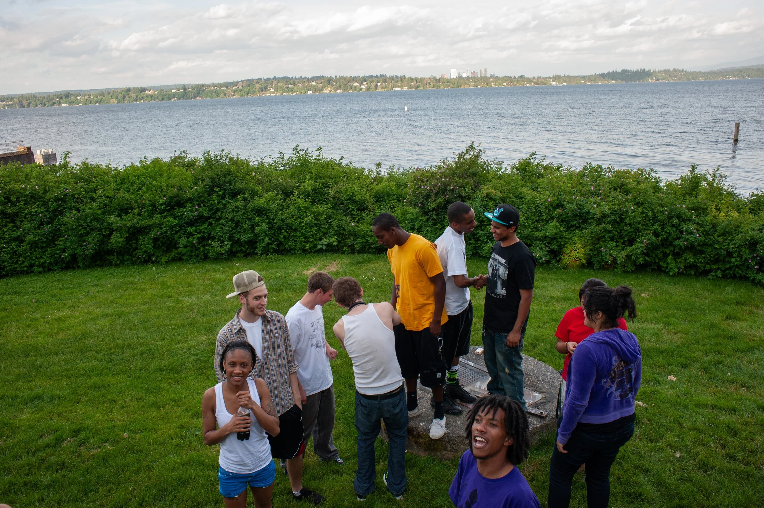 Young friends enjoy a warm afternoon at Denny Park on the shore of Lake Washington in Seattle, Washington, USA on June 6, 2011. 