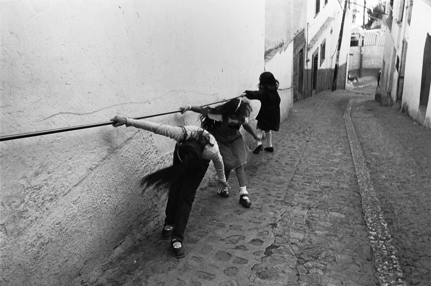 Girls play in Taxco, Mexico in 2000.