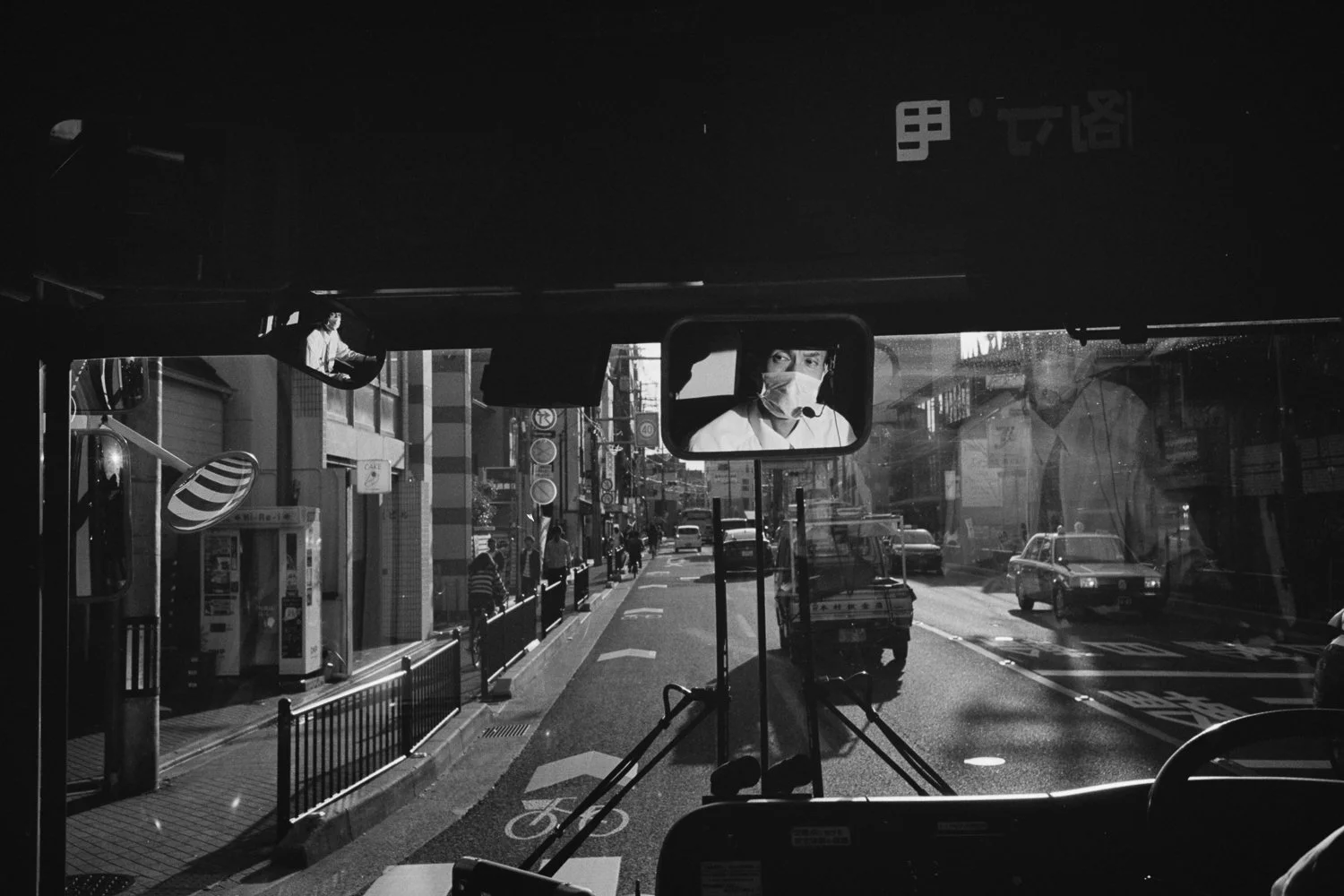 Bus driver in the afternoon light of Kyoto, Japan on May 22, 2018.