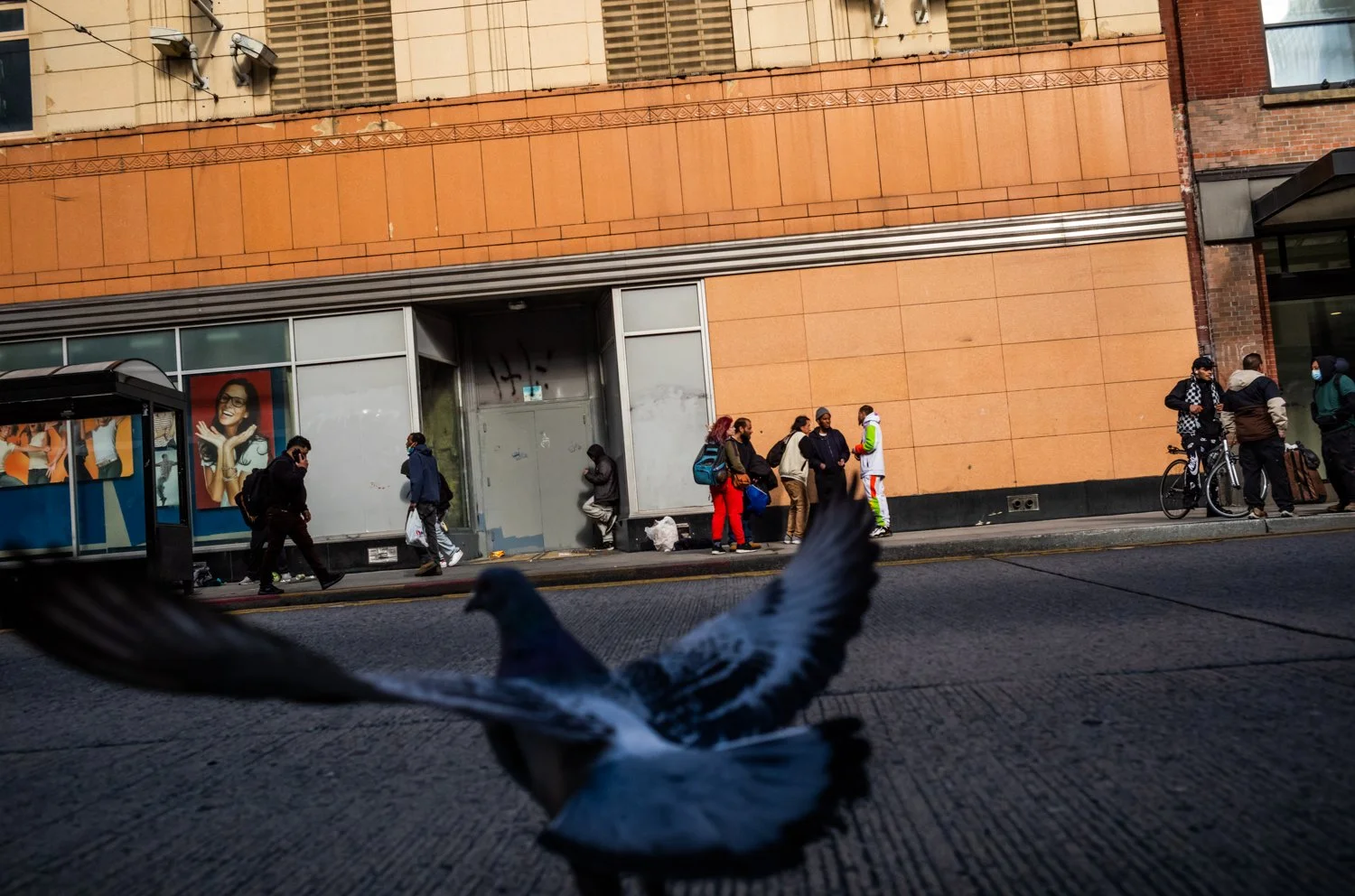 People using fentanyl blend with commuters on 3rd Avenue in Seattle, Washington, USA on March 11, 2023.