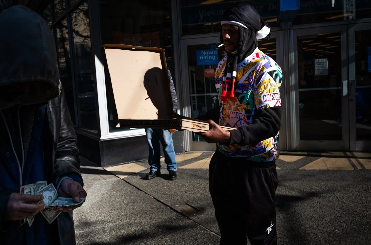 Pizza for sale on 3rd Avenue and Pike Street in Seattle, Washington, USA on February 21, 2022.