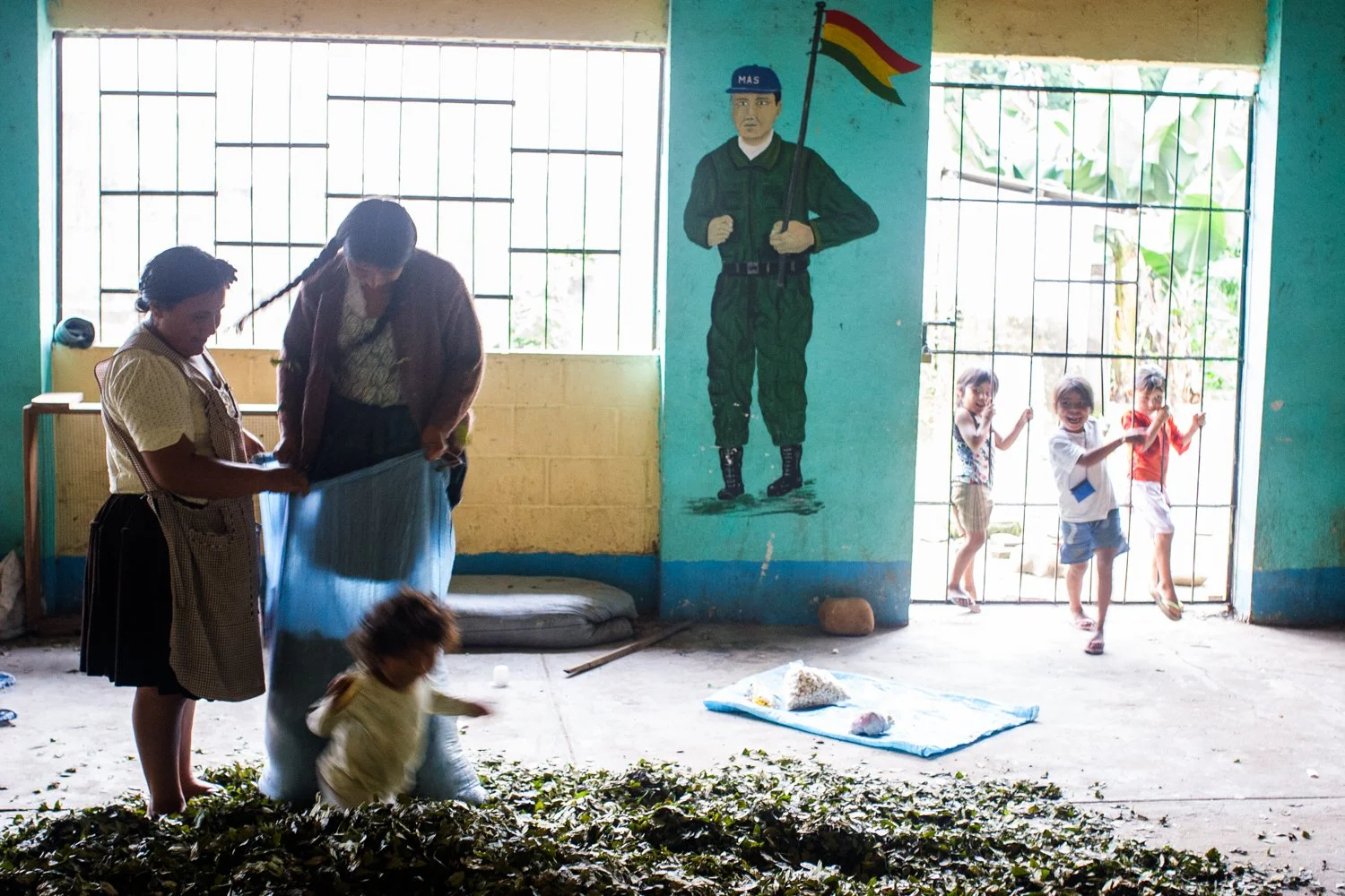 Women bag coca leaves for chewing at the Federation in Chimore in Cochabamba, Bolivia on August 6, 2005.