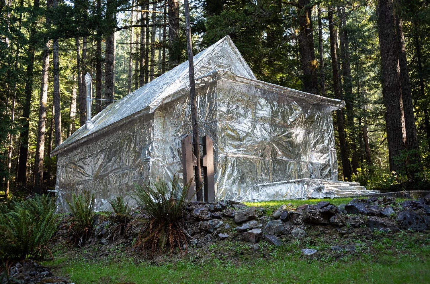 Staircase Ranger Station in Olympic National Park remains wrapped for protection from the Bear Gulch Fire on August 22, 2024, in Washington State, USA. 