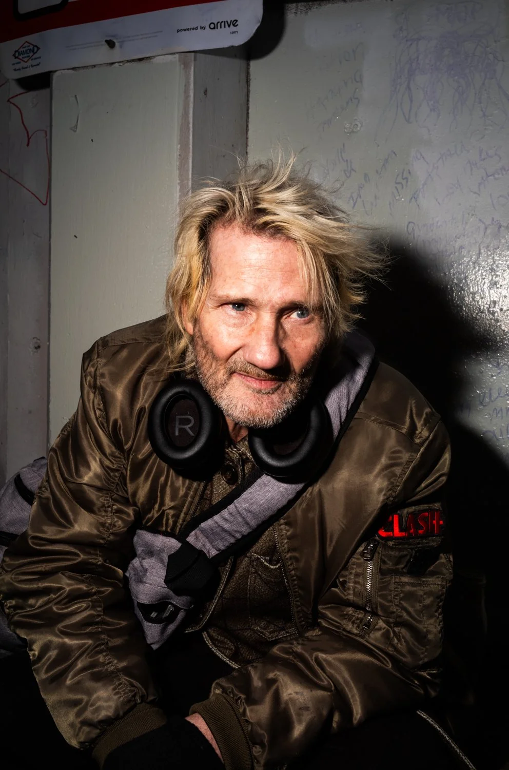 Mark (Damage) Mansfield hangs out in a parking garage on 3rd Avenue in Seattle, Washington, USA on January 23, 2025.