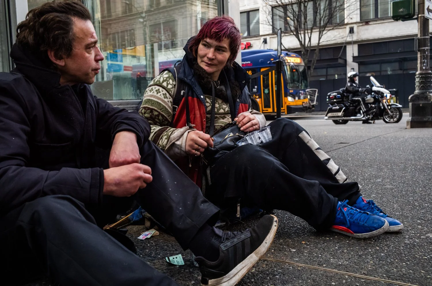 Andrew (L) and Jacob pause on the morning of December 5, 2024 in Seattle, Washington, USA.