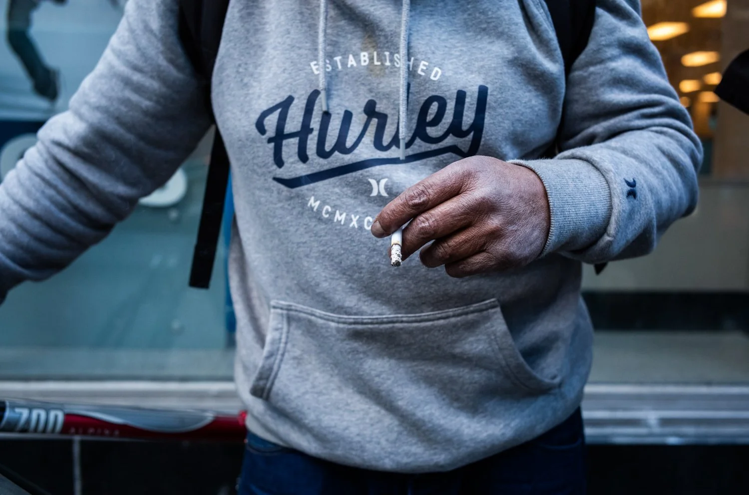 A man who called himself Santa Barbara smokes on 3rd Avenue on April 3, 2023 in Seattle, Washington, USA.
