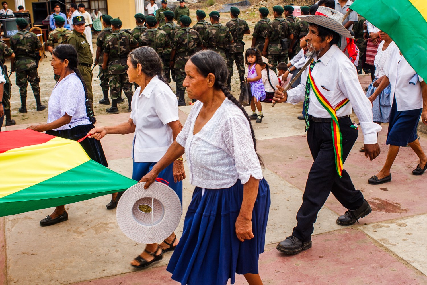 Families march in a parade in the Chapare on Bolivian Independence Day, August 6, 2005.