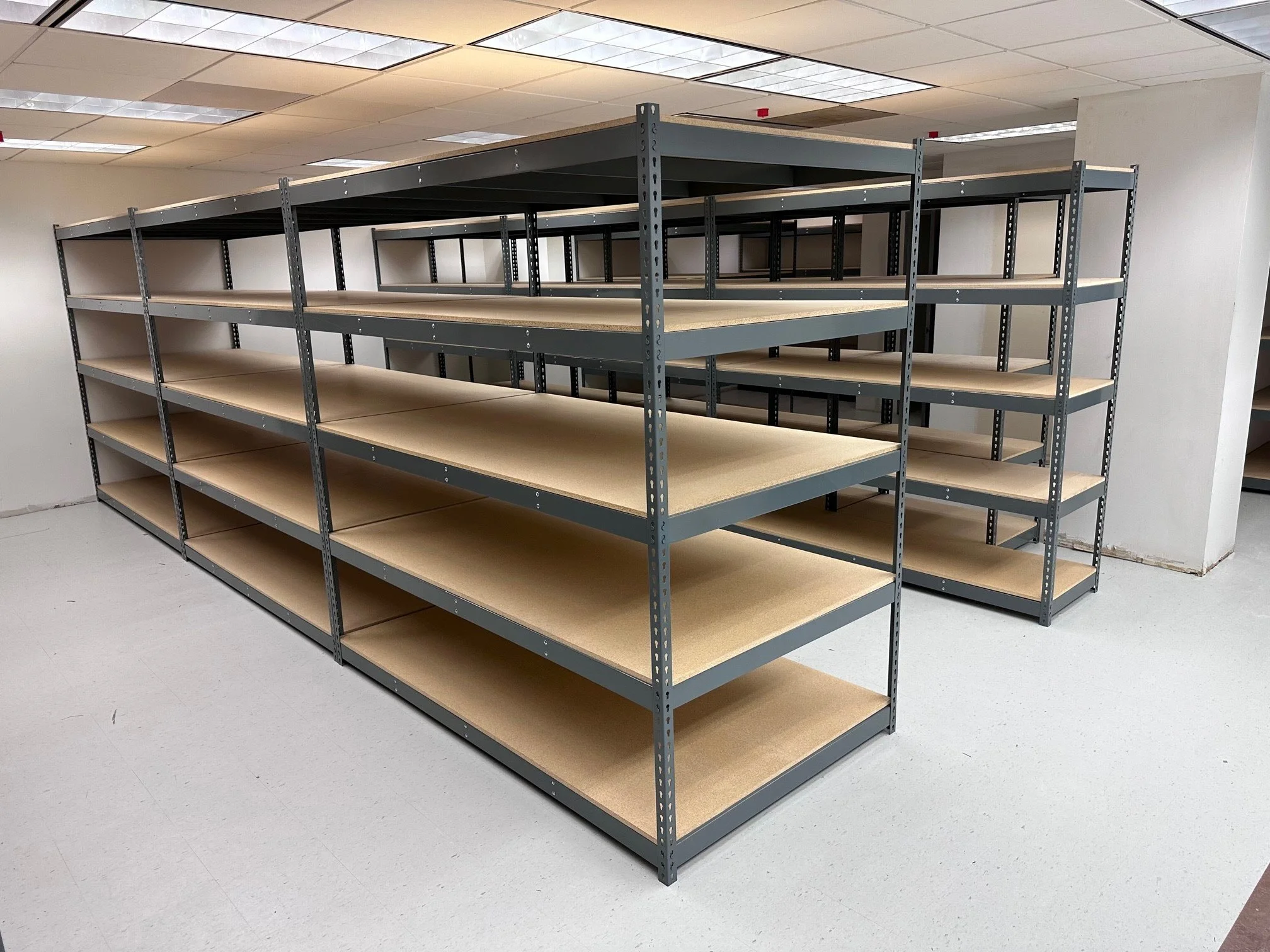 Industrial steel shelving installation for commercial storage and organization