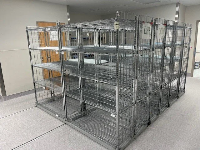 High-density mobile shelving system designed to maximize commercial storage capacity