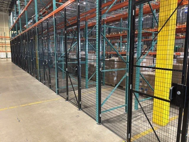 Warehouse security cage and wire partition installation around pallet racking