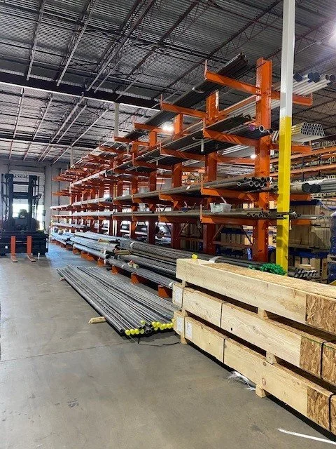 Cantilever racking system planned for organized storage of pipe and long materials in an industrial facility