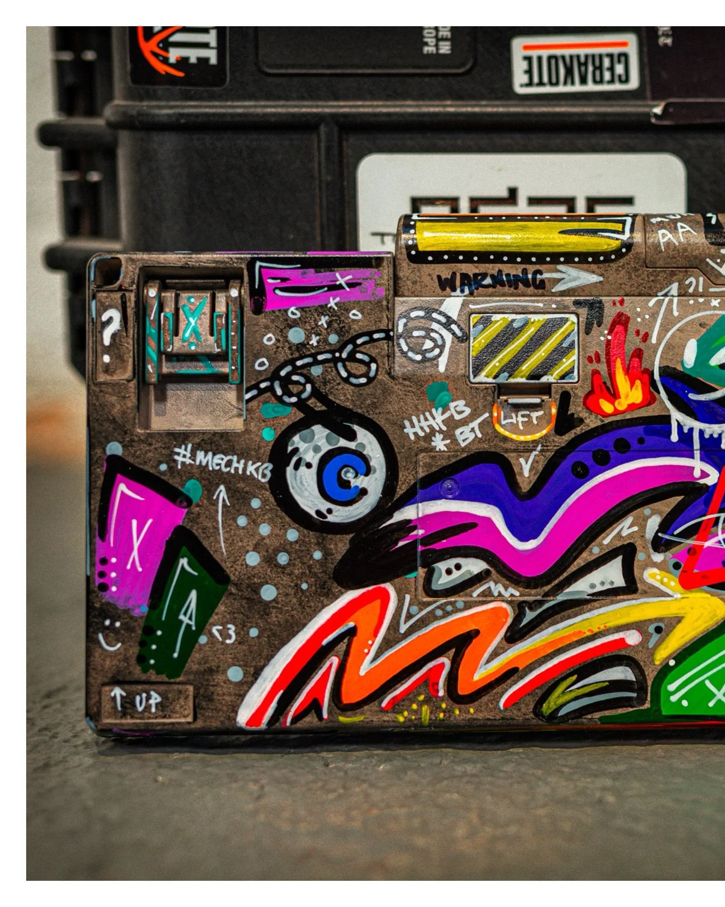 You saw the video &mdash; here are the stills.

Concrete, cracks, graffiti, gloss. Nothing hidden.

Hris&rsquo; HHKB Pro BT in a custom gritty base, texture, glossy black accents, layers and layers and layers of graffiti all sealed up like glistening