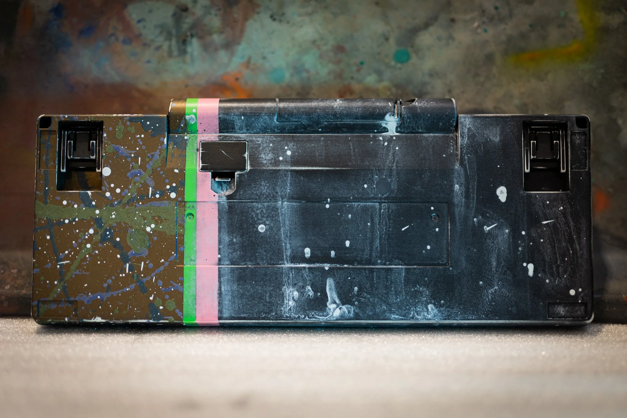 HHKB in a custom application, Graphite Black base, with distressed grey, 2 colour lines, Burnt Bronze with splatter and speckle 