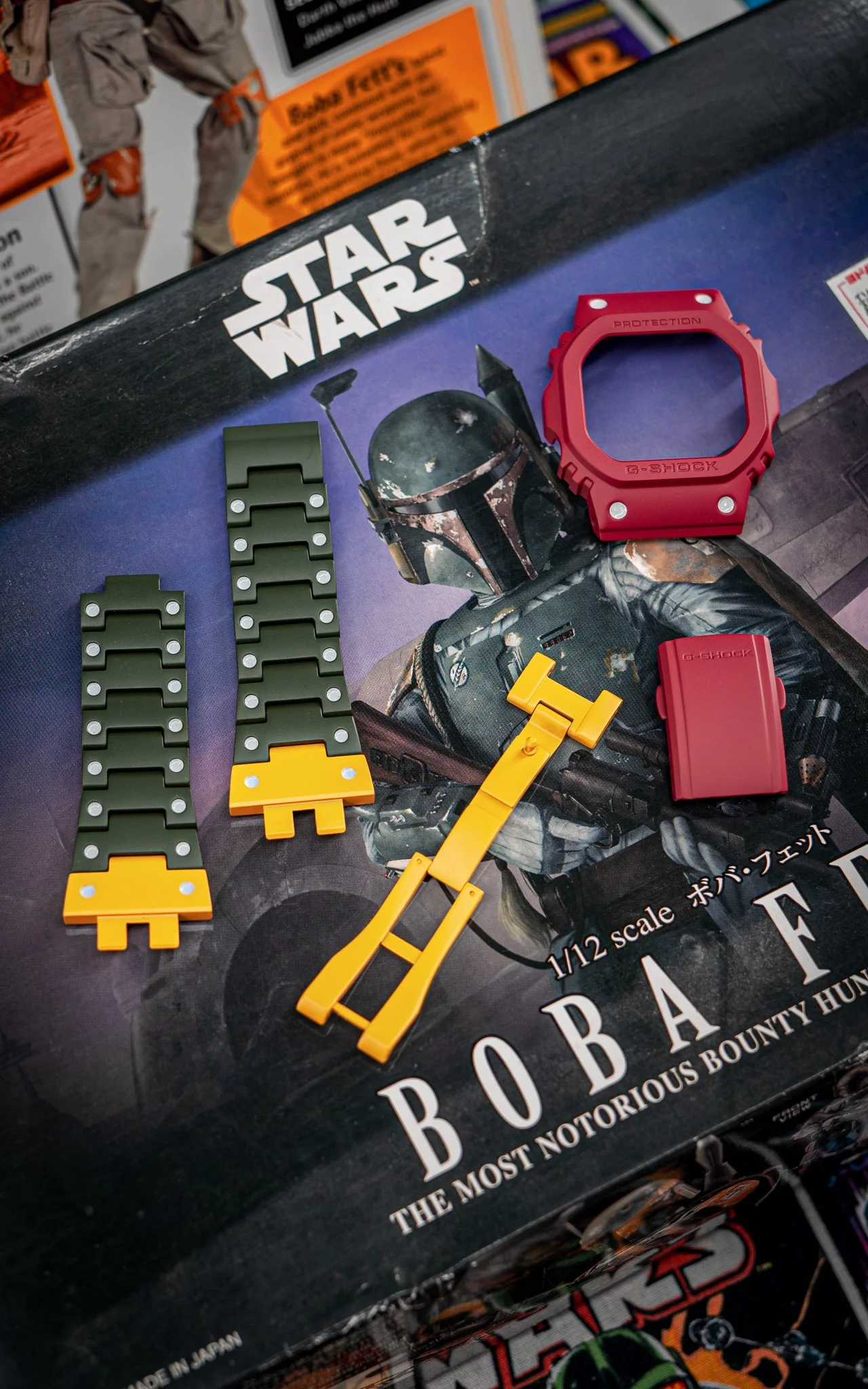 Metal G-shock in a Boba Fett style using H-400 Eastern Front Green, H-144 Corvette Yellow, H-221 Crimson and an infill of a custom mix 'French Grey'