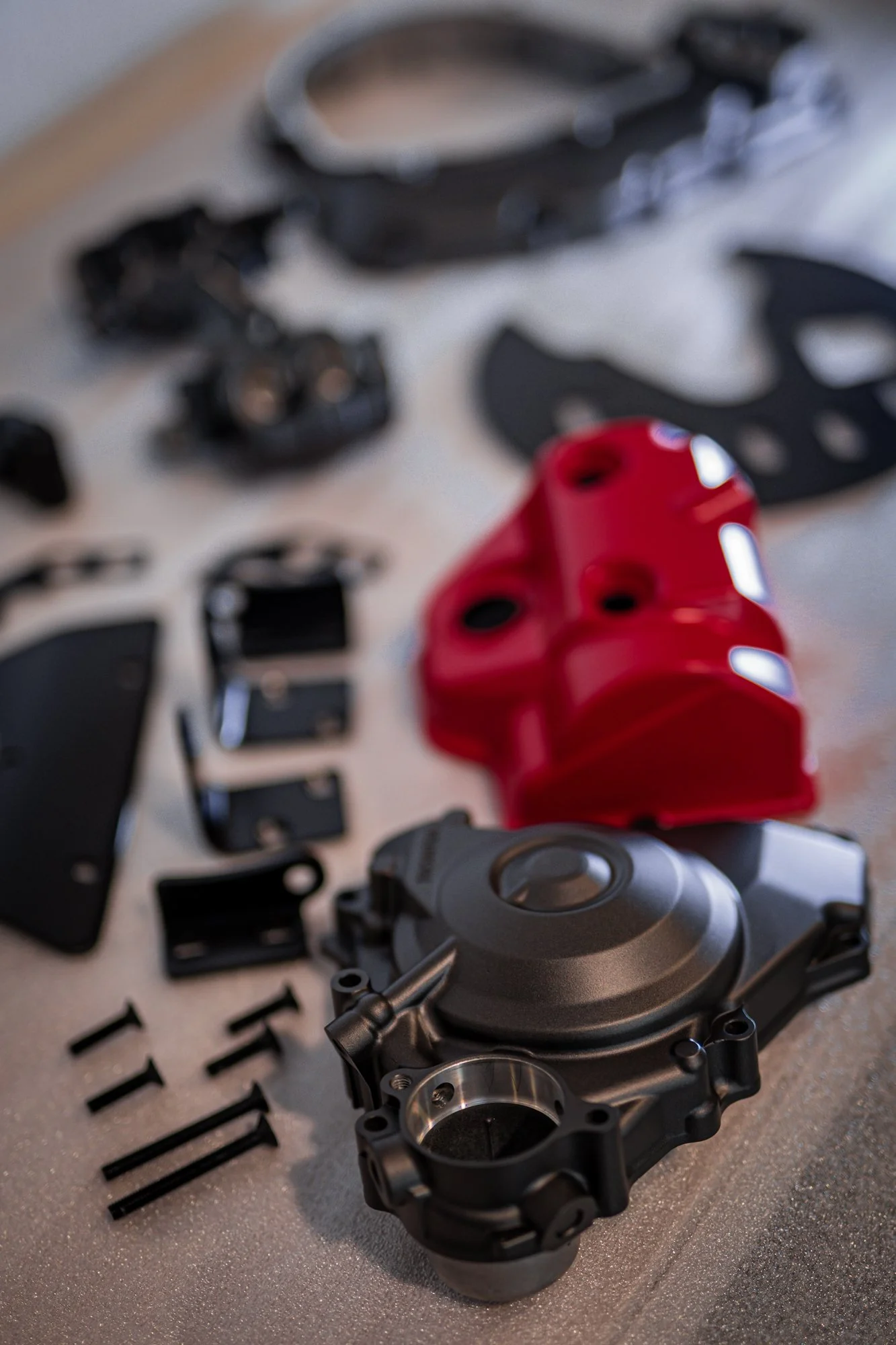 Hoinda Quad Bike rocker cover, engine case, mounts and bolts in USMC Red and Tungsten Cerakote