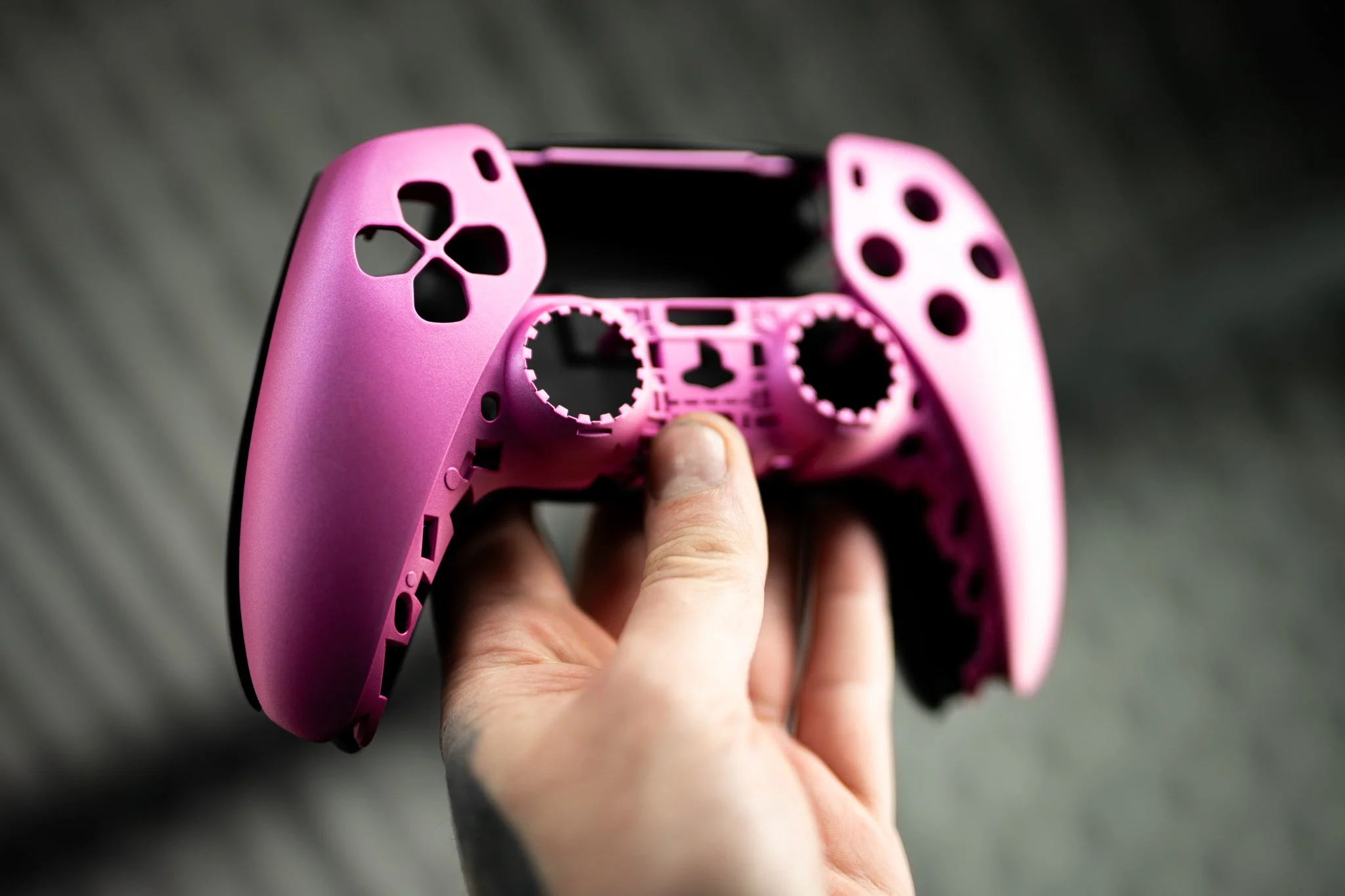 PS4 / DualShock 5 controller in Super Grip on the rear with H-141 Prison Pink and FX Mystique with Matte Armor Clear on the top 