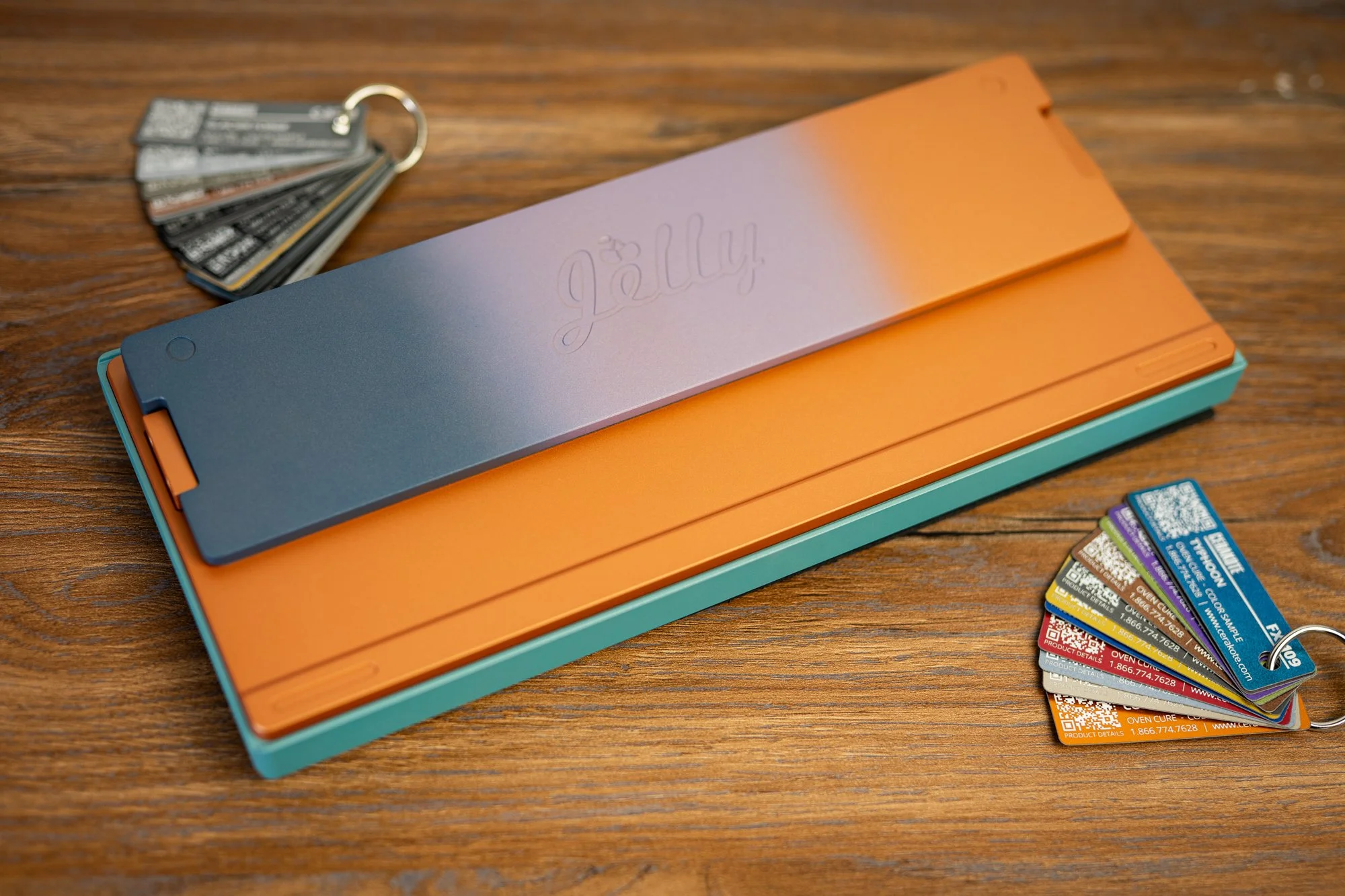 Jelly Epoch in a custom mix of Aztec Teal and Satin Mag for the top and a three way fade of Blue Titanium, Crushed Orchid and Copper 