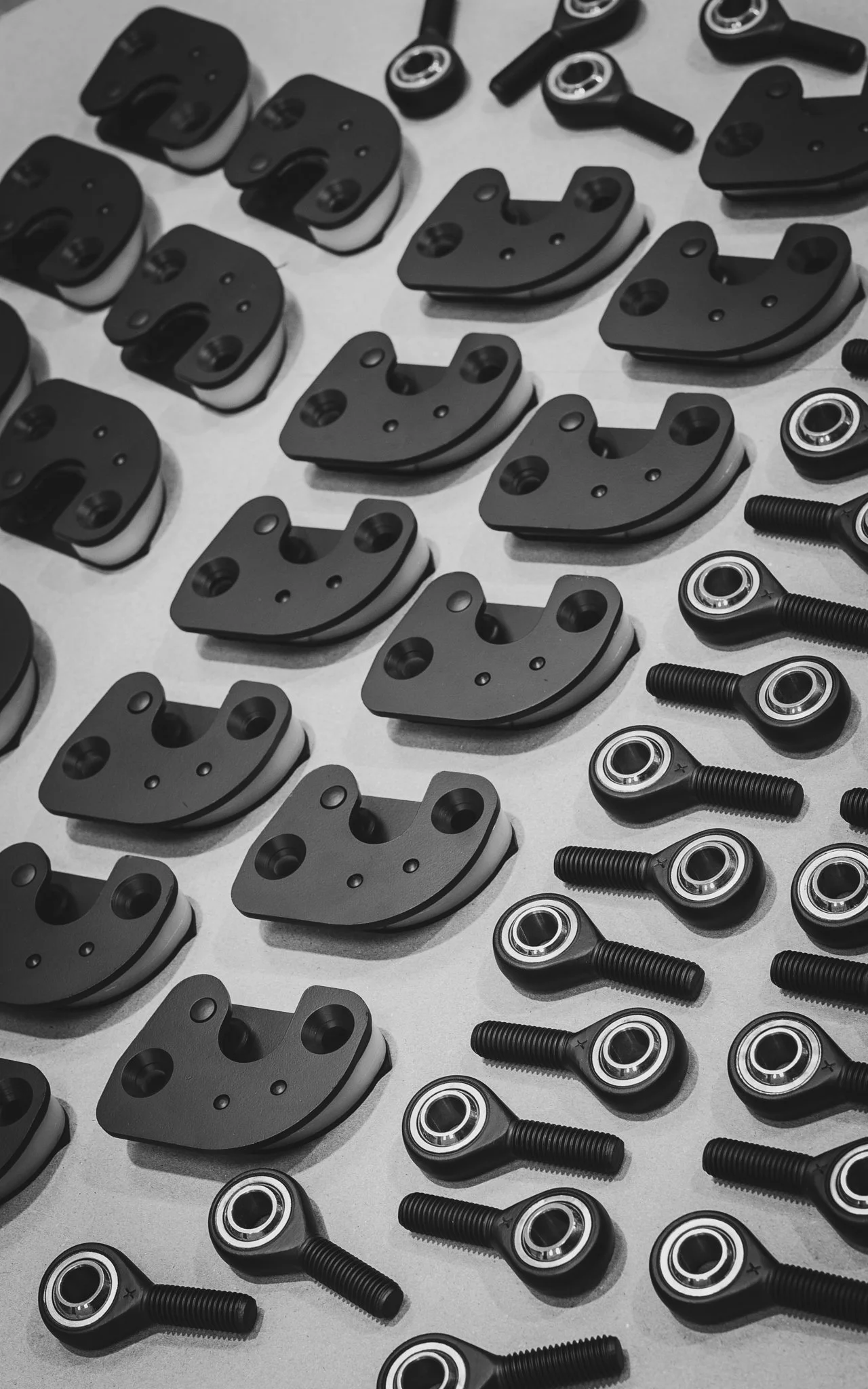 PORSCHE DOOR STRIKERS AND ROD ENDS IN H SERIES GRAPHITE BLACK AND ELITE SERIES BLACKOUT