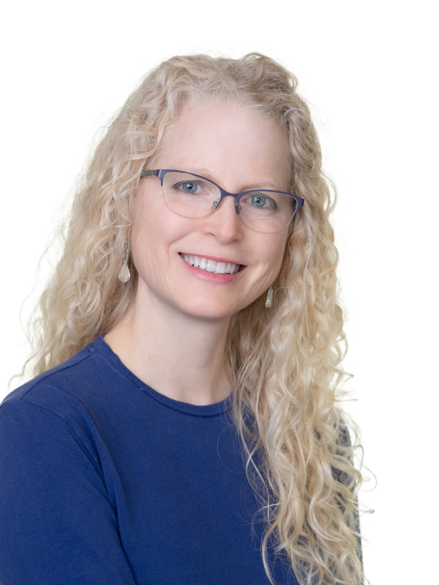 Author Louise M. Aamodt's photo, in color, with glasses.