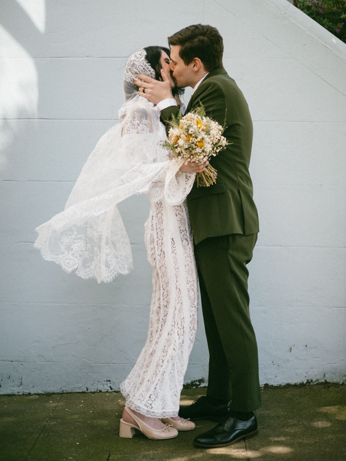 Just married, San Francisco edition. 🤍

After saying &ldquo;I do&rdquo; at the San Francisco Botanical Gardens, we wandered over to the Painted Ladies for a few quiet, just-us moments &mdash; veil in the breeze, city buzzing around them, and that we