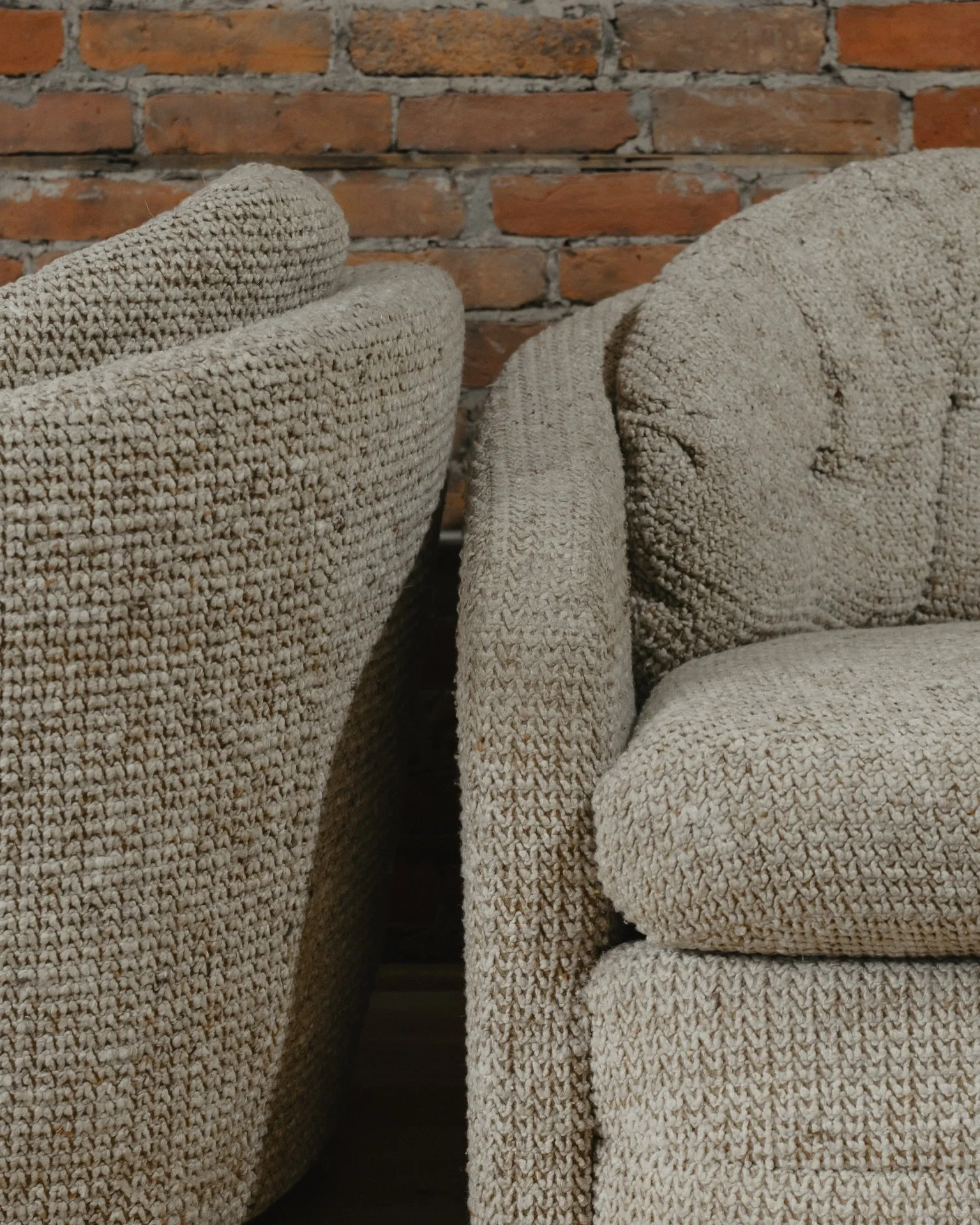 Seating for two! Loving these mid-century modern barrel swivel club chairs. 

They are heavily textured, super comfortable with the curved back, and perfect for creating balanced and flexible seating for your home.