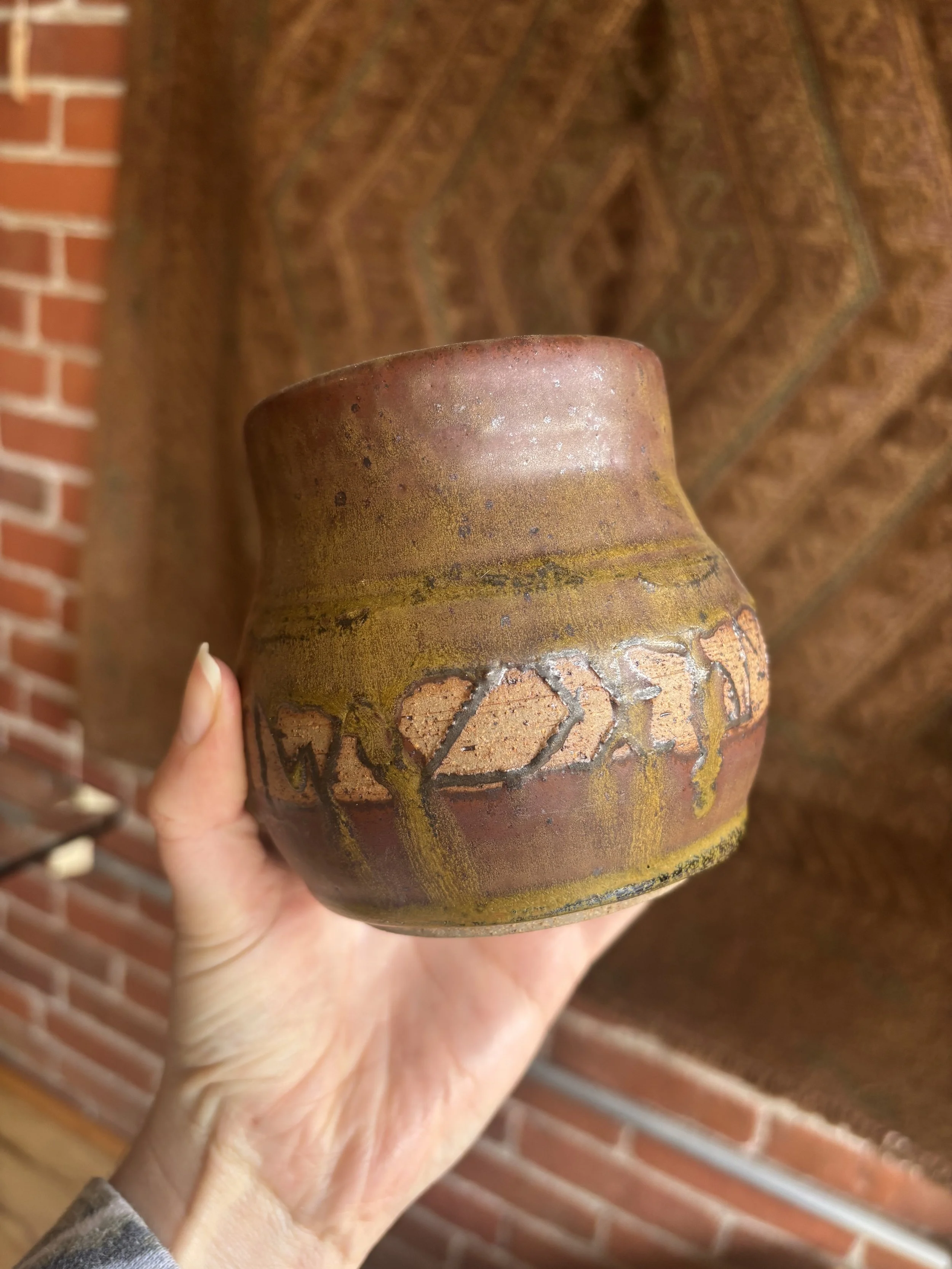 Cracked earth vessel