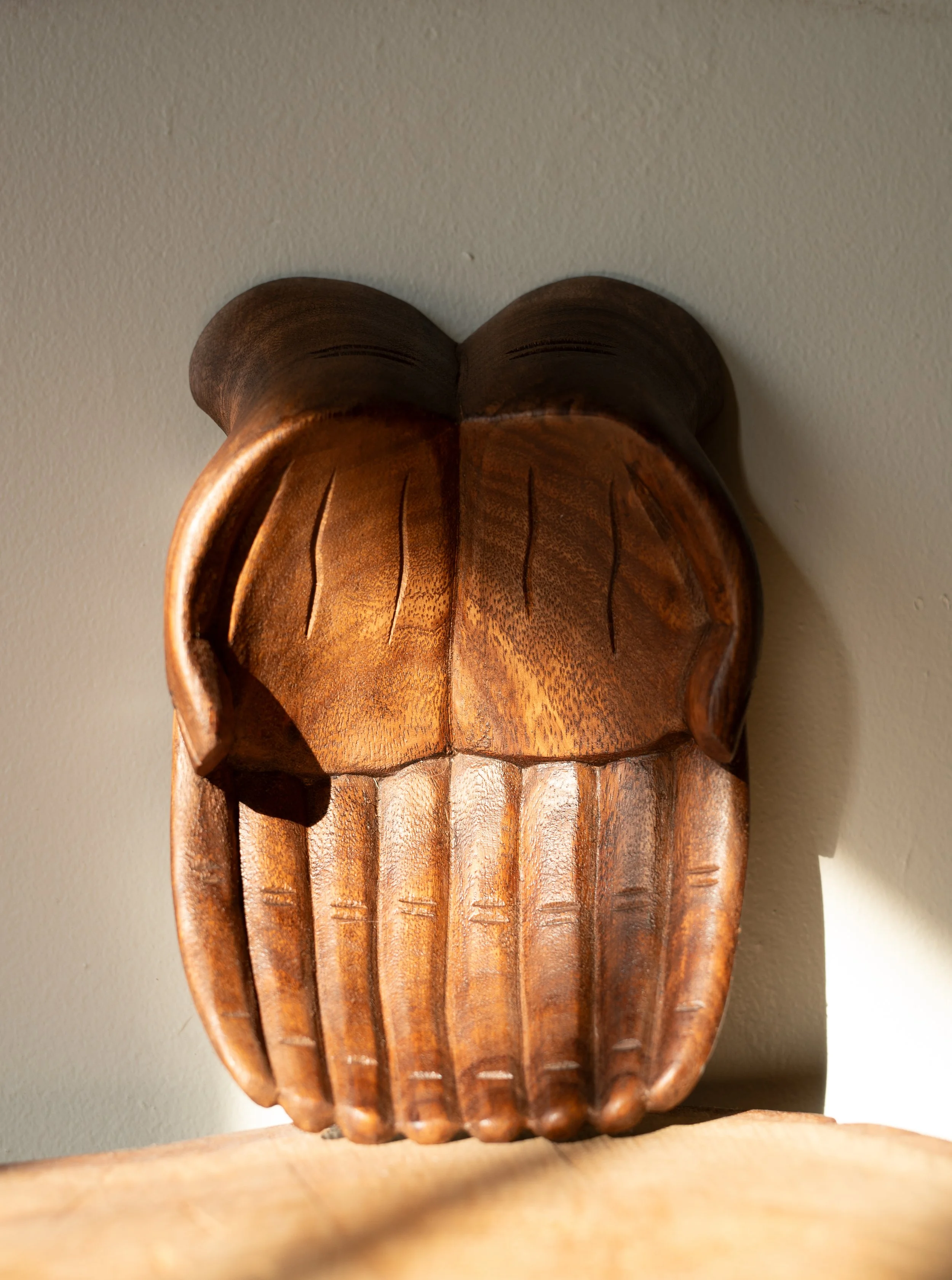 Carved hands