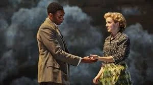 Small Island by Helen Edmundson based on the novel by Andrea Levy. National Theatre Live to 25 June 2020. 5*****. William Russell.