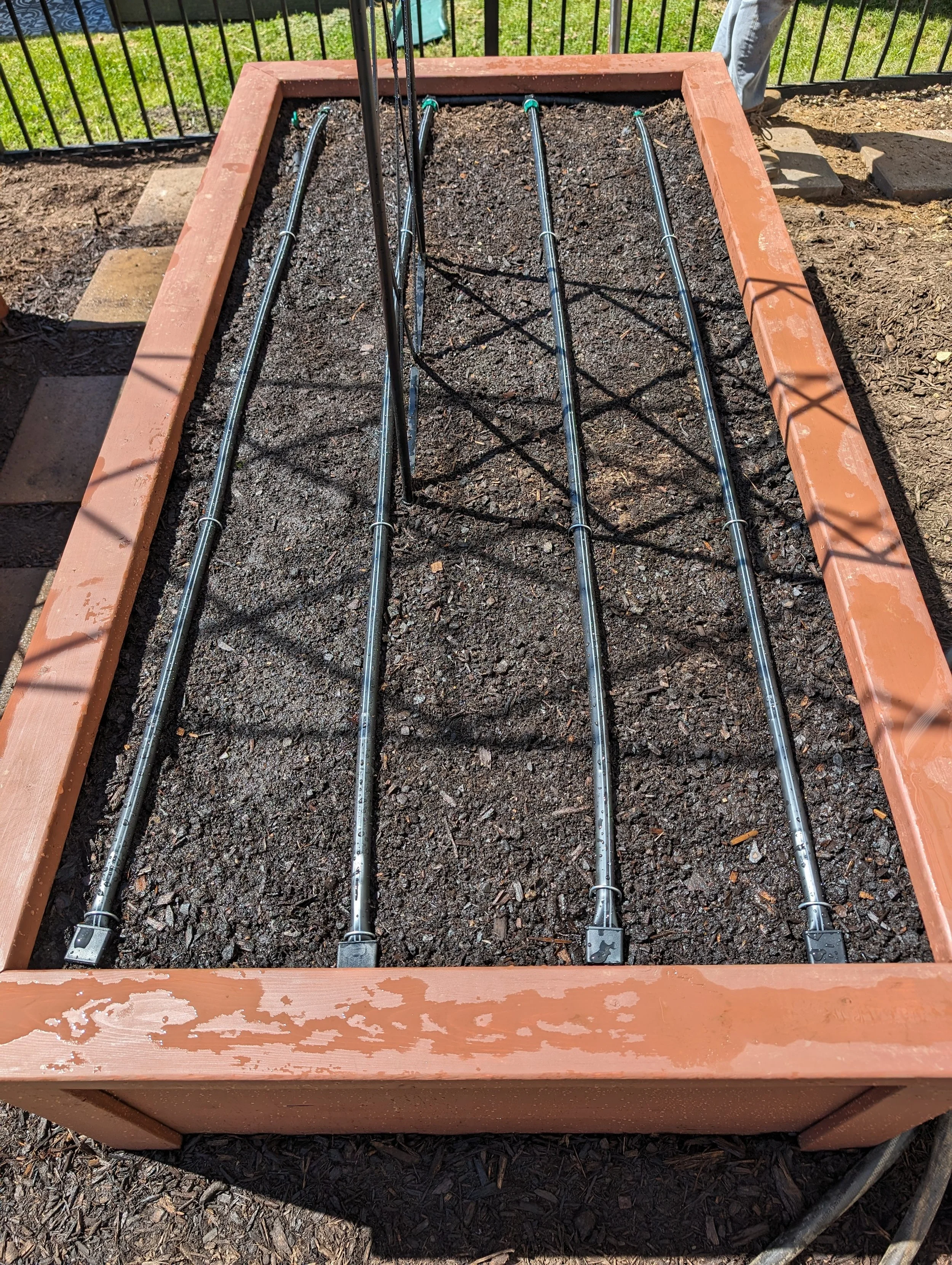 Custom drip irrigation in raised bed garden by Harvested Gardens