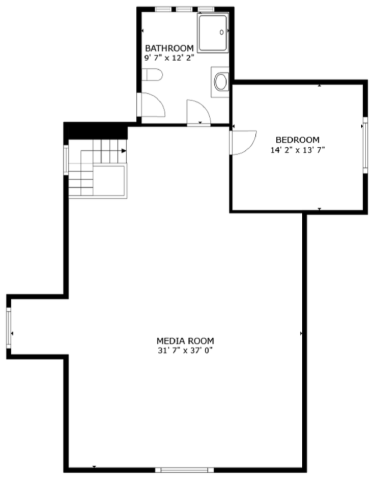 Floor plan showing a media room, bedroom, bathroom, and staircase.