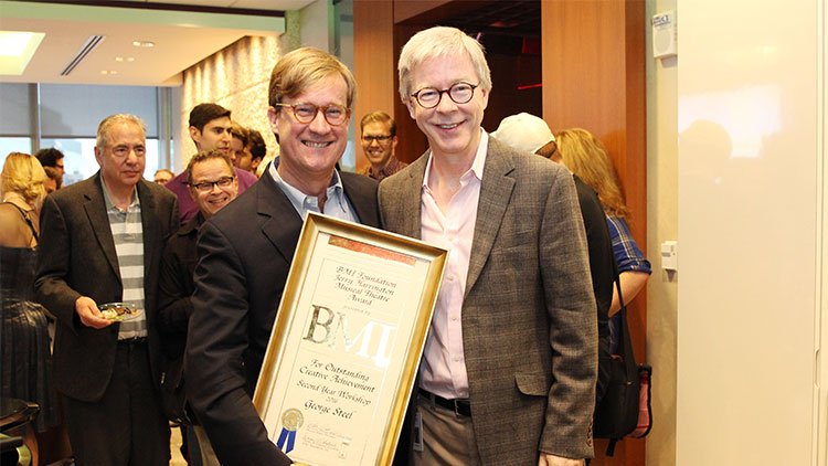  BMI Foundation's Pat Cook with Jerry Harrington Award winner George Steel. 