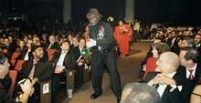  Tenor sax player Big Jay McNeely makes his way to the Apollo stage to perform his 1949 hit, “The Deacon’s Hop”  photos: Gary Gershoff  