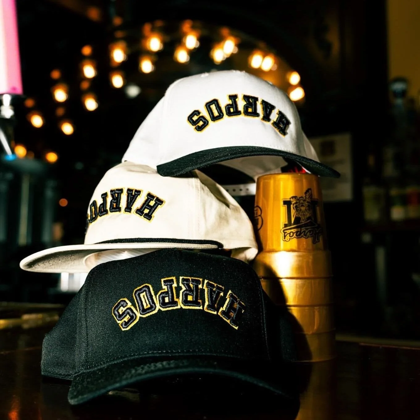 Super trendy hats for @harposcomo with puff embroidery and an upside-down design 🔥⁠
⁠
#merch #embroidery #embroideryart #hat #screenprinting #customtees #customapparel #screenprintinglife #printmaking