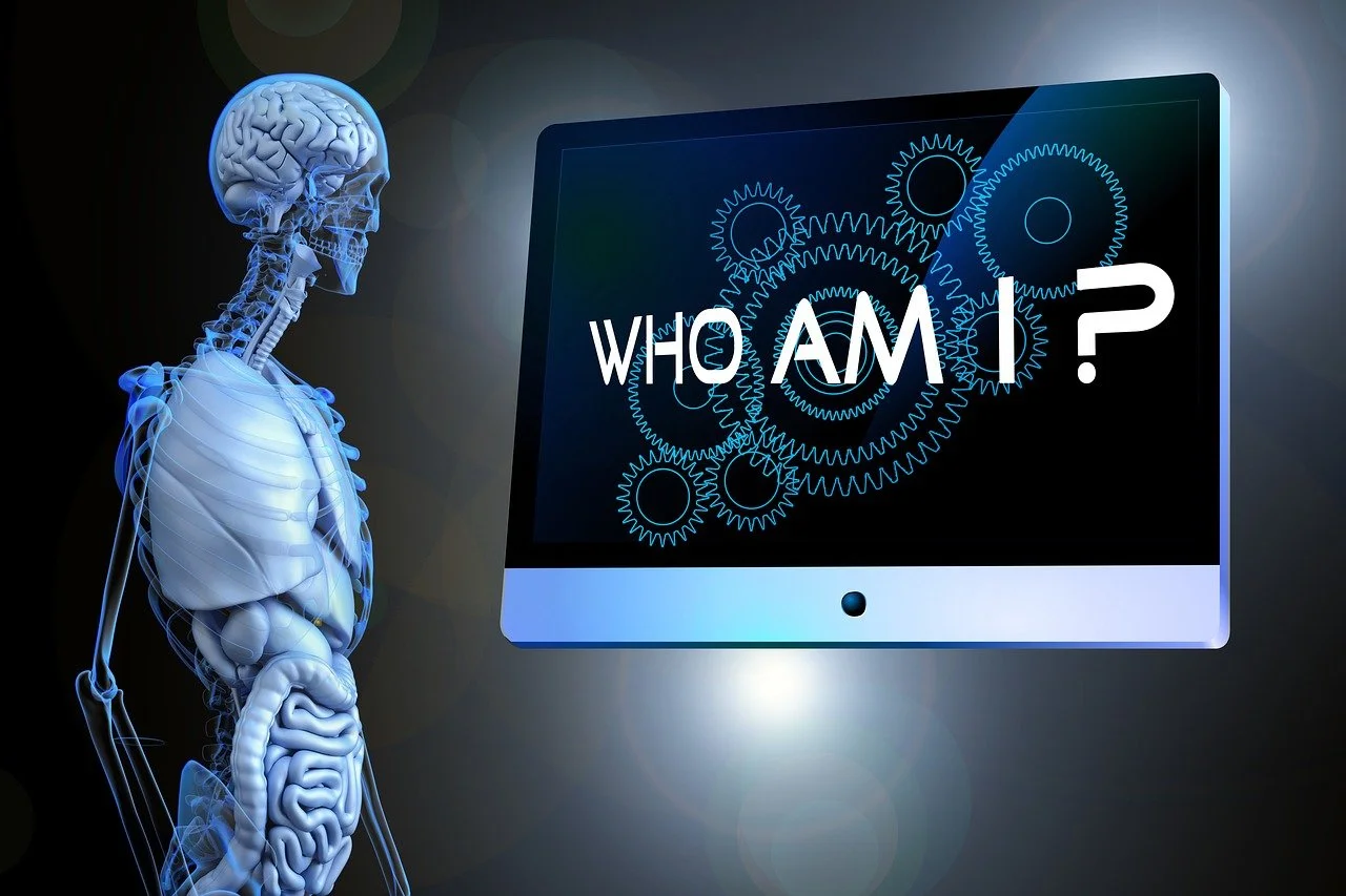 "Who am I?" verwijst naar de menselijke biomechanica waaruit een persoonlijkheid afgeleid kan worden.