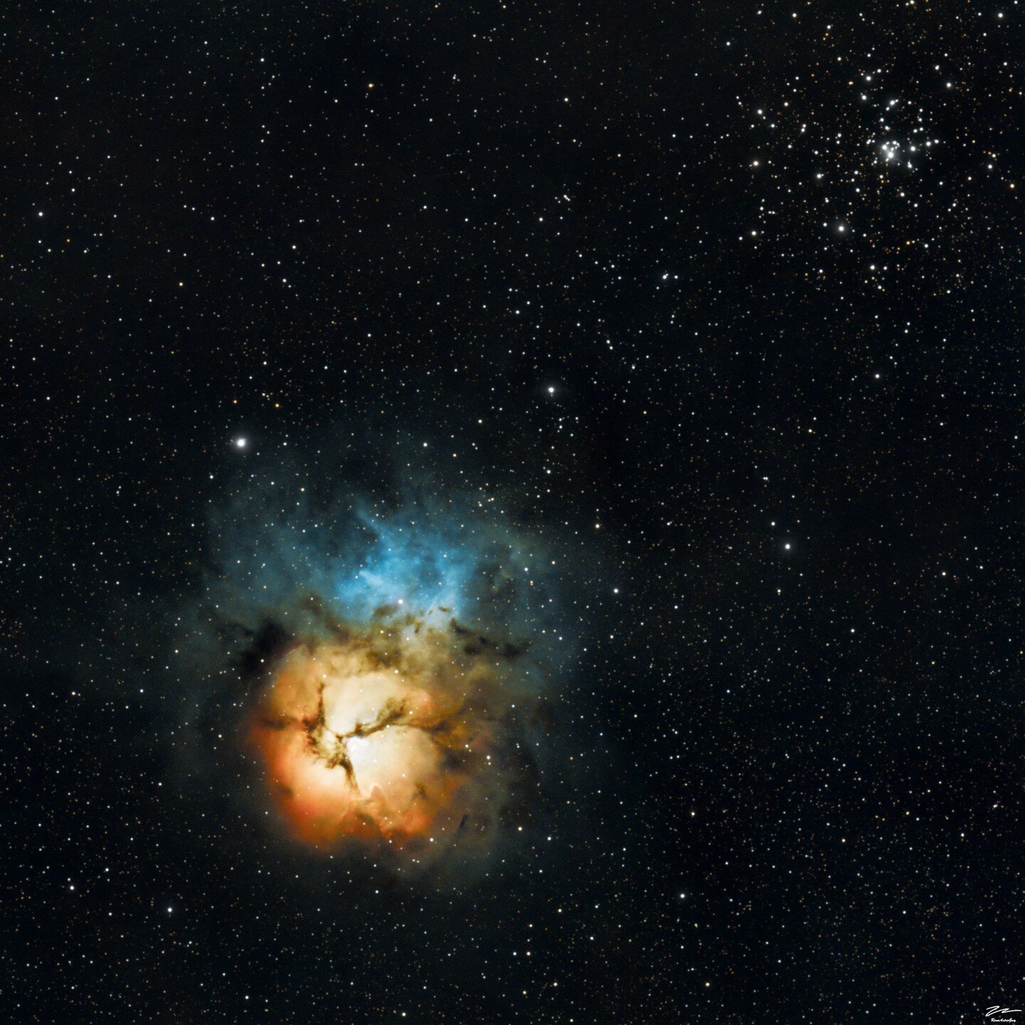 M20 & M21 - Trifid Nebula & Webb's Cross
The Trifid Nebula is unique in the fact that its comprised of four separate components in one: an open cluster of stars, an emission nebula (red), a reflection nebula (blue), and dark nebula.
This i