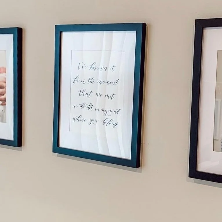 Simple, yet elegant calligraphy home decor of a couple's first dance lyrics